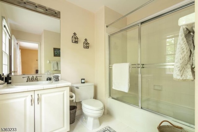 21 Stafford Ln, Bedminster Twp, NJ 07921 - full bath featuring toilet, bath / shower combo with glass door, vanity, and tile patterned flooring