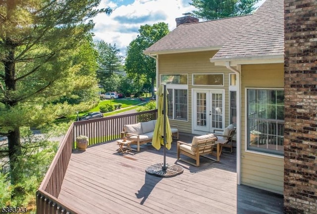 21 Stafford Ln, Bedminster Twp, NJ 07921 - wooden deck with french doors and an outdoor living space