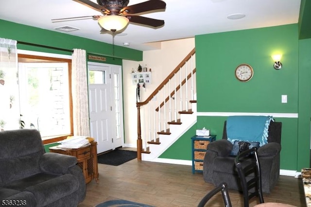 75 Sunrise Ter, Cedar Grove Twp, NJ 07009 - living area with stairway, ceiling fan, wood finished floors, and baseboards