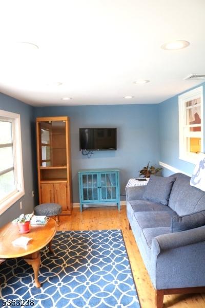75 Sunrise Ter, Cedar Grove Twp, NJ 07009 - living area featuring wood finished floors and baseboards
