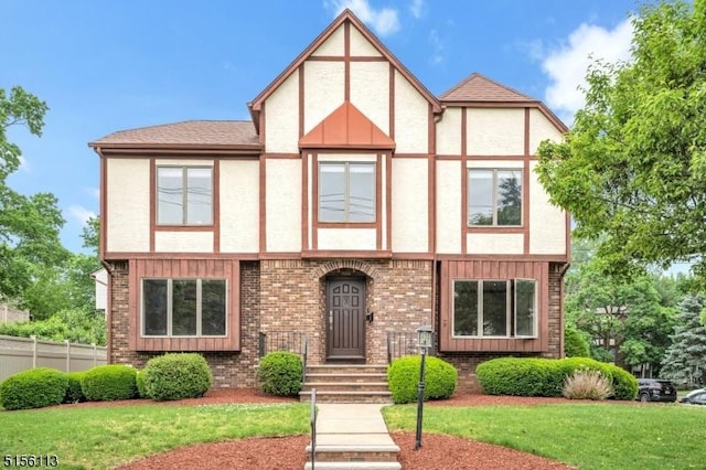 23 Bohnert Pl, Waldwick Boro, NJ 07463 - tudor home with stucco siding and brick siding