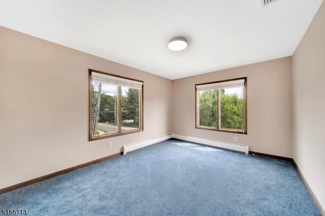 23 Bohnert Pl, Waldwick Boro, NJ 07463 - carpeted spare room with healthy amount of natural light, a baseboard radiator, and baseboards