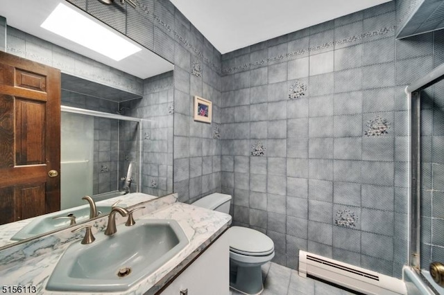 23 Bohnert Pl, Waldwick Boro, NJ 07463 - bathroom featuring tile walls, a baseboard radiator, toilet, a shower with door, and vanity