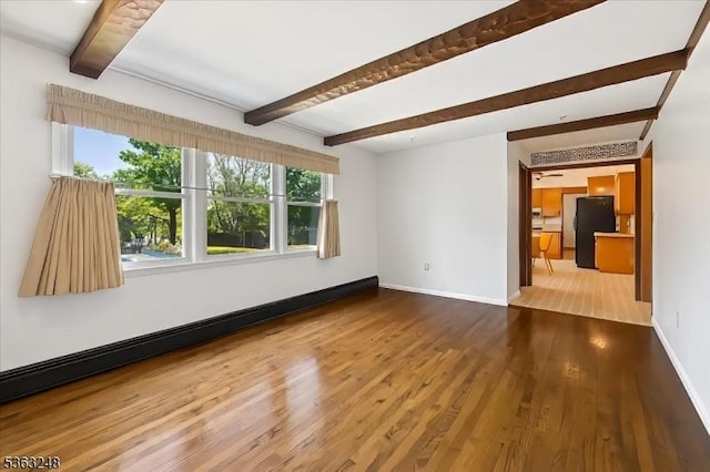 45 Churchill Rd, Cresskill Boro, NJ 07626 - spare room with beam ceiling and wood finished floors