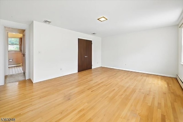 45 Churchill Rd, Cresskill Boro, NJ 07626 - unfurnished room featuring baseboard heating and light wood-style flooring