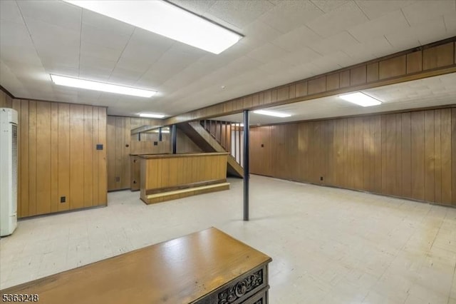 45 Churchill Rd, Cresskill Boro, NJ 07626 - finished basement with wooden walls, a heating unit, and stairway