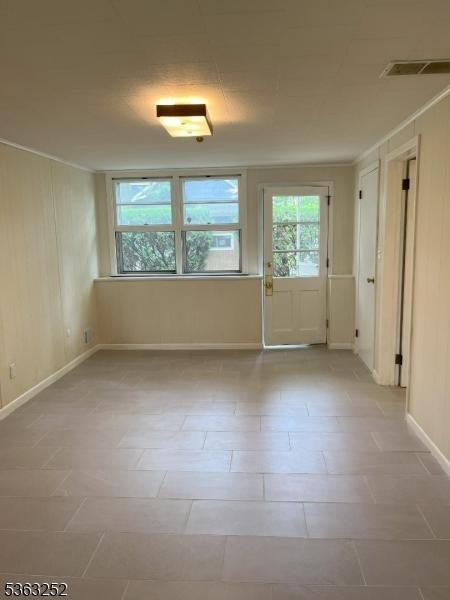 2 Perry Rd, Bloomfield Twp, NJ 07003 - spare room featuring baseboards