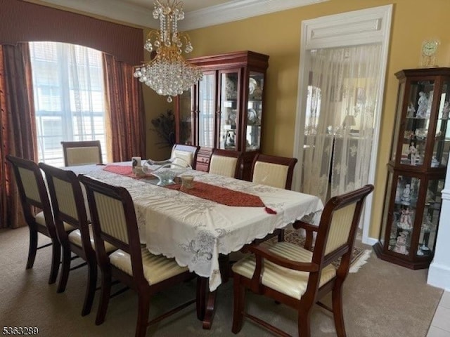 515 Crossfields Ln, Franklin Twp, NJ 08873 - dining space featuring a chandelier, carpet floors, and crown molding