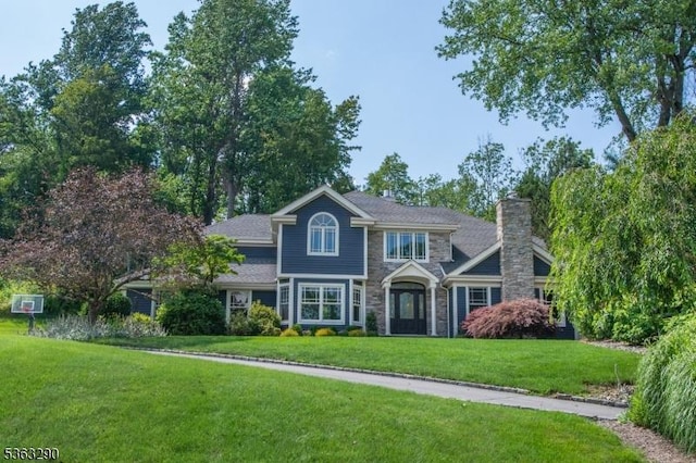 14 Mount Freedom Ave, Randolph Twp, NJ 07869 - view of front of property featuring a front yard, stone siding, and a chimney