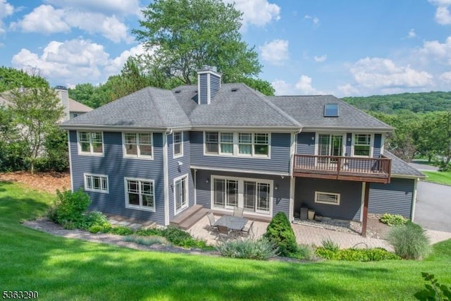 14 Mount Freedom Ave, Randolph Twp, NJ 07869 - back of property with a chimney, a lawn, a wooden deck, a patio area, and a shingled roof