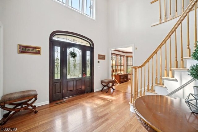 14 Mount Freedom Ave, Randolph Twp, NJ 07869 - foyer featuring light wood-type flooring, stairs, and a high ceiling