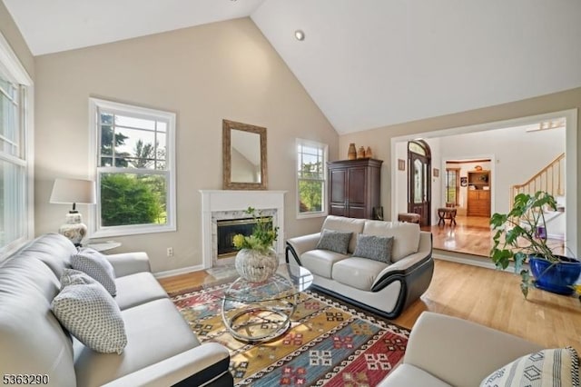 14 Mount Freedom Ave, Randolph Twp, NJ 07869 - living area featuring high vaulted ceiling, plenty of natural light, wood finished floors, and a high end fireplace
