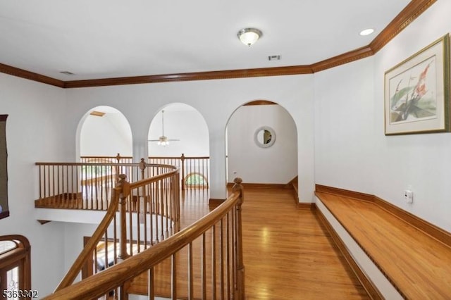 13 E Cove Ln, Morris Twp, NJ 07960 - corridor featuring light wood-style flooring, crown molding, baseboards, and an upstairs landing
