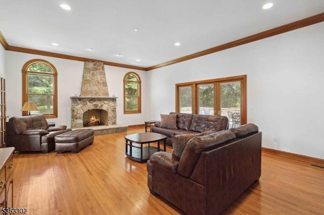 13 E Cove Ln, Morris Twp, NJ 07960 - living room with light wood finished floors, crown molding, french doors, recessed lighting, and a fireplace