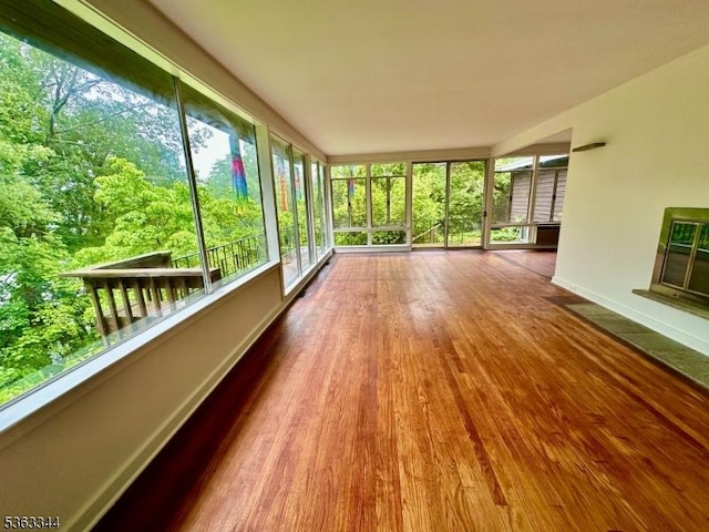 24 Lake Trl, Harding Twp, NJ 07960 - unfurnished sunroom featuring wood finished floors and baseboards