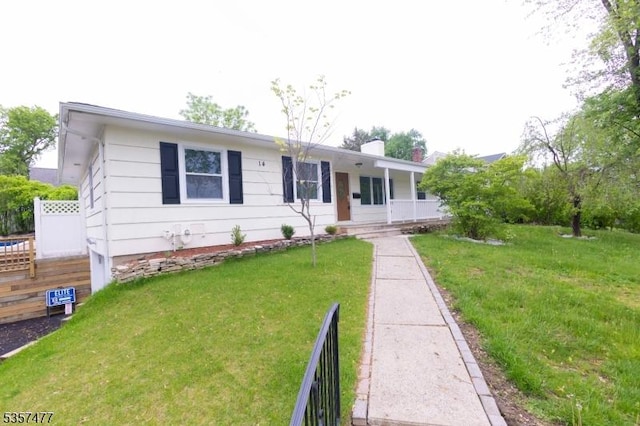 14 Rohn St, East Hanover Twp, NJ 07936 - ranch-style house featuring covered porch and a chimney