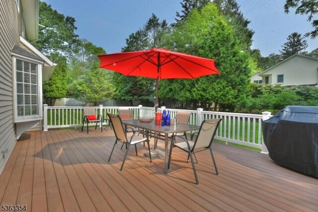 50 Van Schaik Ln, Wyckoff Twp, NJ 07481 - deck with outdoor dining space and a grill