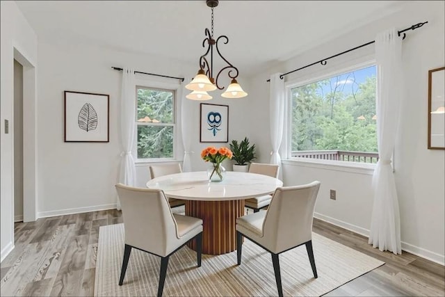 14 Prospect Pl, Morris Twp, NJ 07960 - dining space with light wood-type flooring and a chandelier