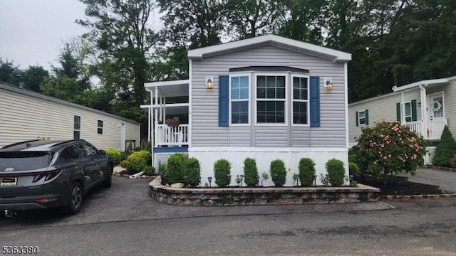 7 Makepeace Dr Unit 7, Jefferson Twp, NJ 07438 - manufactured / mobile home with covered porch