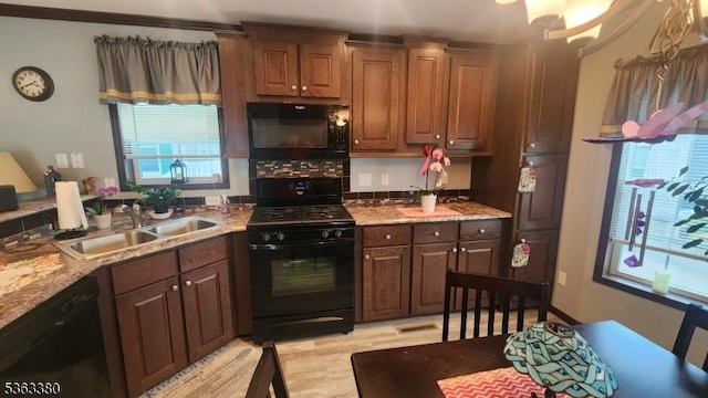 7 Makepeace Dr Unit 7, Jefferson Twp, NJ 07438 - kitchen with black appliances, plenty of natural light, and light stone countertops