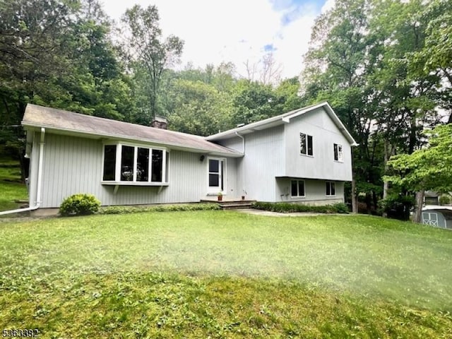 64 Plotts Rd, Newton Town, NJ 07860 - view of front facade featuring a front yard and a chimney