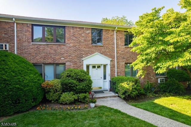 93A Troy Dr Unit A, Springfield Twp, NJ 07081 - view of front of home featuring a front lawn and brick siding