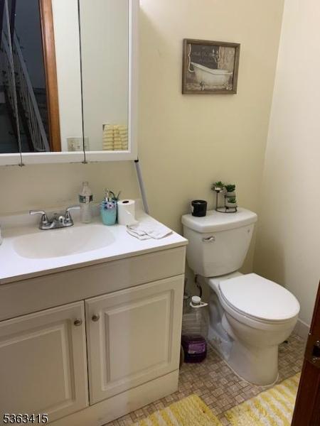 678 Broad St Unit A-4, Clifton City, NJ 07013 - half bathroom with vanity and toilet