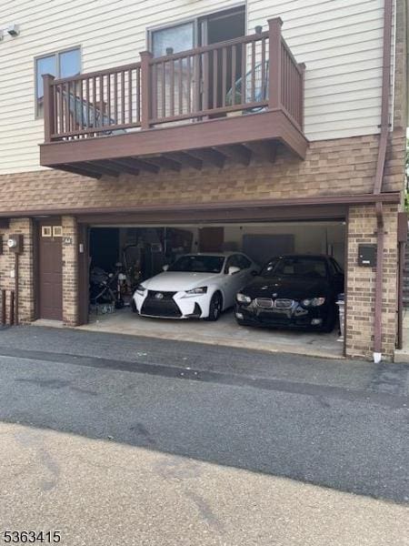 678 Broad St Unit A-4, Clifton City, NJ 07013 - view of parking / parking lot featuring a garage