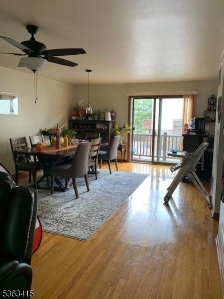 678 Broad St Unit A-4, Clifton City, NJ 07013 - dining room with a ceiling fan and wood finished floors