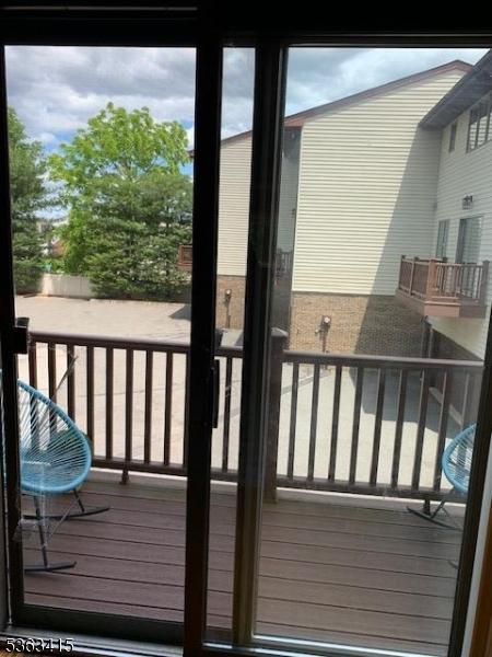 678 Broad St Unit A-4, Clifton City, NJ 07013 - doorway to outside with wood finished floors