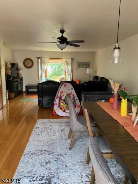 678 Broad St Unit A-4, Clifton City, NJ 07013 - dining room featuring a ceiling fan and wood finished floors