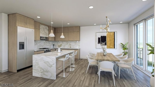 491 Central Ave Unit 4, New Providence Boro, NJ 07974 - kitchen with appliances with stainless steel finishes, plenty of natural light, backsplash, wood finished floors, and recessed lighting