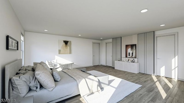 491 Central Ave Unit 4, New Providence Boro, NJ 07974 - living area featuring light wood-style flooring and recessed lighting