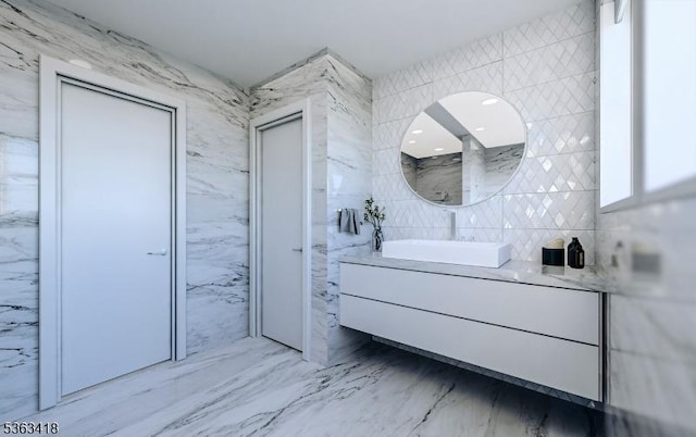 491 Central Ave Unit 4, New Providence Boro, NJ 07974 - bathroom with vanity, tile walls, and marble finish floors