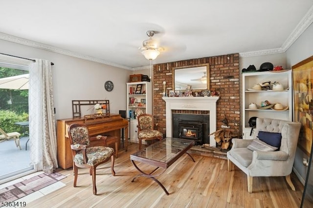 1 Beaver Brook Dr, Vernon Twp, NJ 07461 - living area featuring light wood-type flooring, a brick fireplace, crown molding, and ceiling fan