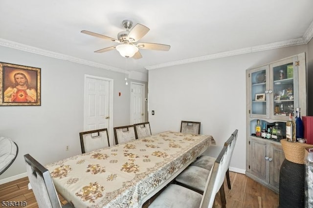 1 Beaver Brook Dr, Vernon Twp, NJ 07461 - dining room with crown molding, wood finished floors, and a ceiling fan