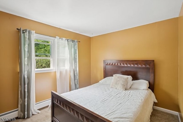 1 Beaver Brook Dr, Vernon Twp, NJ 07461 - carpeted bedroom featuring a baseboard heating unit and baseboards