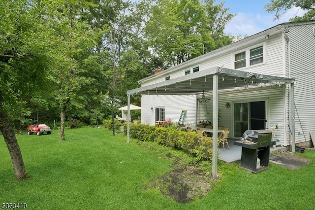1 Beaver Brook Dr, Vernon Twp, NJ 07461 - back of house with a lawn and a patio area