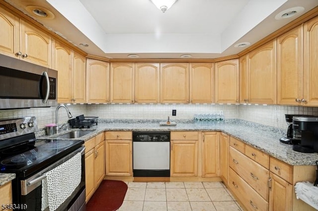 1 Beaver Brook Dr, Vernon Twp, NJ 07461 - kitchen with appliances with stainless steel finishes, light stone countertops, light tile patterned floors, and light brown cabinetry