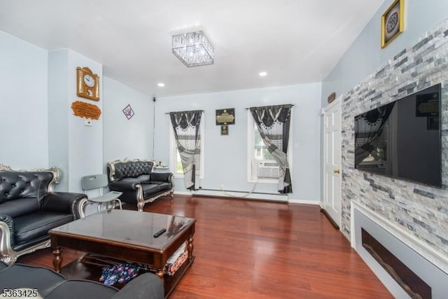 56 Holsman St Unit 2, Paterson City, NJ 07522 - living room with wood finished floors, a baseboard radiator, cooling unit, a fireplace, and recessed lighting
