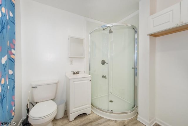 56 Holsman St Unit 2, Paterson City, NJ 07522 - full bathroom featuring a stall shower, wood finished floors, and vanity