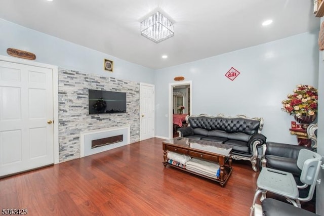 56 Holsman St Unit 2, Paterson City, NJ 07522 - living room featuring a fireplace, wood finished floors, and recessed lighting