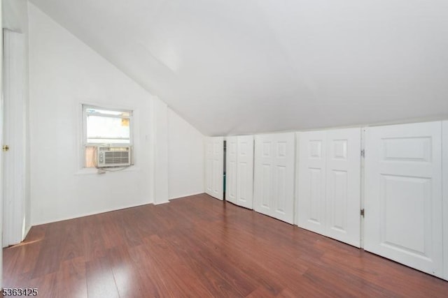 56 Holsman St Unit 2, Paterson City, NJ 07522 - bonus room featuring vaulted ceiling, cooling unit, and dark wood-style floors