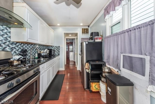 56 Holsman St Unit 2, Paterson City, NJ 07522 - kitchen featuring stainless steel gas range, wall chimney exhaust hood, ceiling fan, white cabinets, and crown molding