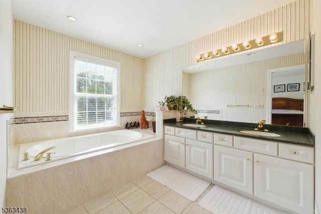 22 Young Ct, Chester Twp, NJ 07930 - full bath with double vanity, a garden tub, tile patterned floors, wallpapered walls, and ensuite bathroom