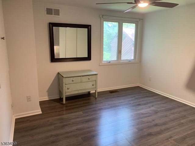 17 Village Way Unit 4, Vernon Twp, NJ 07462 - unfurnished bedroom with dark wood-style flooring and a ceiling fan