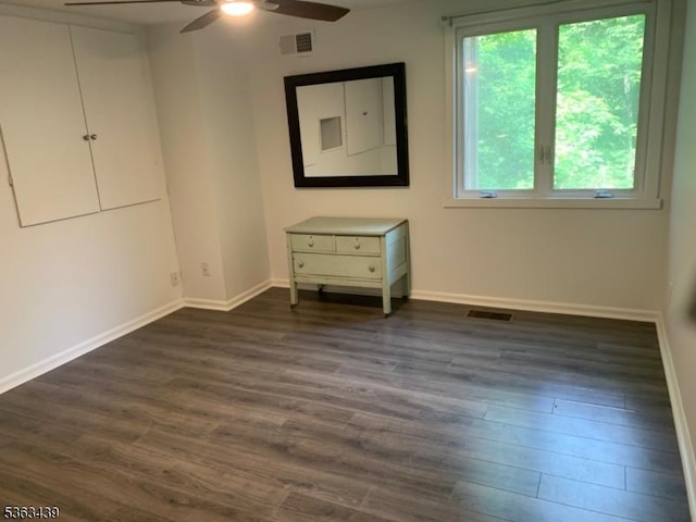 17 Village Way Unit 4, Vernon Twp, NJ 07462 - empty room featuring a ceiling fan and dark wood finished floors