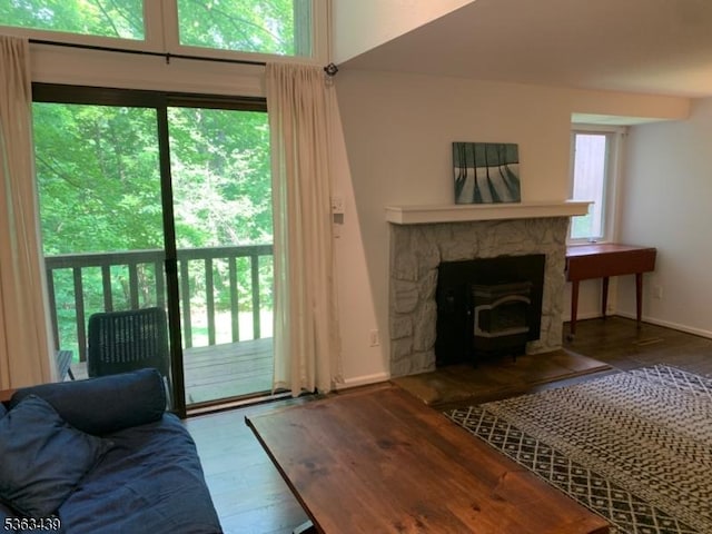 17 Village Way Unit 4, Vernon Twp, NJ 07462 - living area with wood finished floors and a fireplace