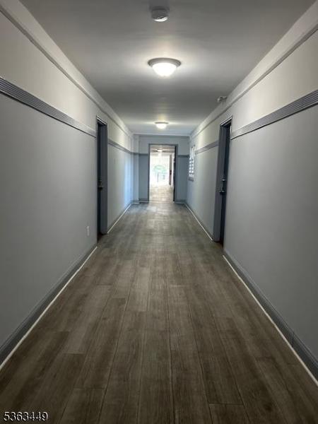 816-826 W Grand St Unit 3I, Elizabeth City, NJ 07202 - corridor featuring dark wood-type flooring