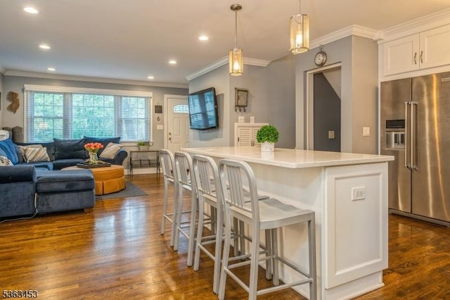 76 W Valley View Dr, Morristown Town, NJ 07960 - kitchen with high quality fridge, crown molding, a center island, dark wood-style floors, and white cabinetry